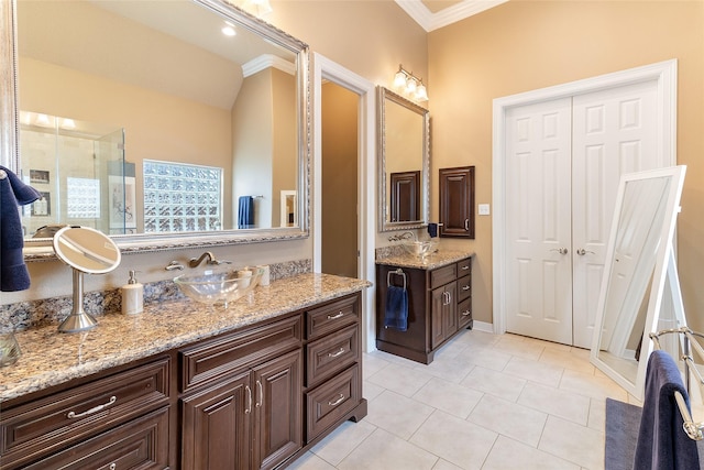 208 Canyon Oak Dr, Lake Jackson, TX 77566 - full bathroom with ornamental molding, tile patterned flooring, and two vanities