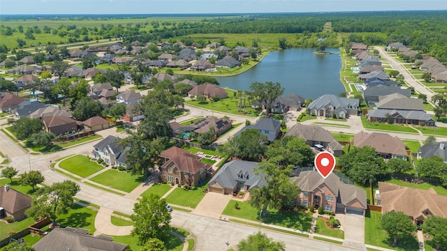208 Canyon Oak Dr, Lake Jackson, TX 77566 - view of property location featuring a large body of water, nearby suburban area, and a heavily wooded area
