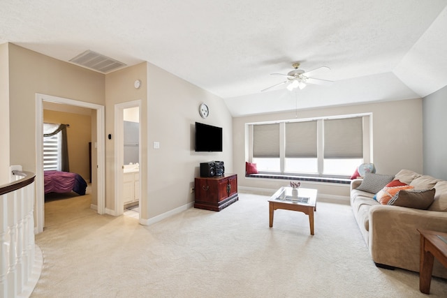 7719 Allegro Dr, Houston, TX 77040 - living area with ceiling fan, light colored carpet, baseboards, and lofted ceiling