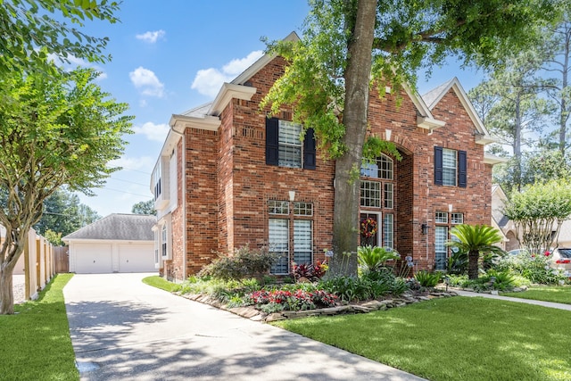 7719 Allegro Dr, Houston, TX 77040 - traditional home with brick siding, a front lawn, and a detached garage