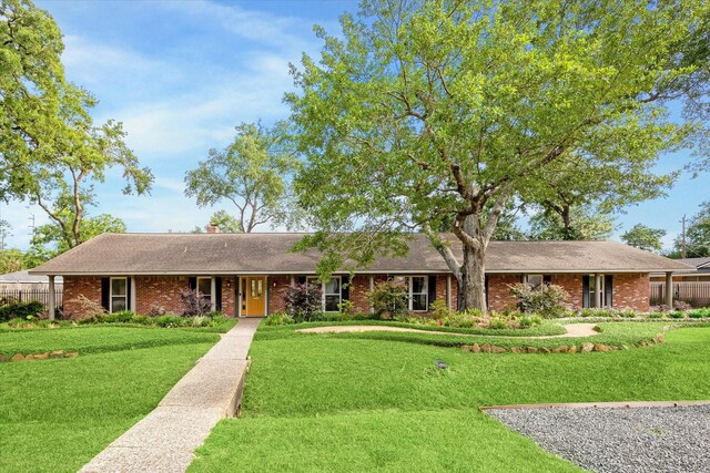 1415 Lehman St, Houston, TX 77018 - ranch-style house with brick siding and a chimney