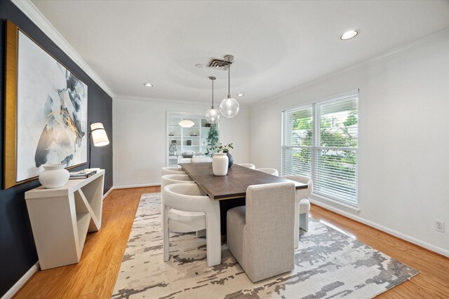1415 Lehman St, Houston, TX 77018 - dining room featuring ornamental molding, baseboards, light wood-style floors, and recessed lighting
