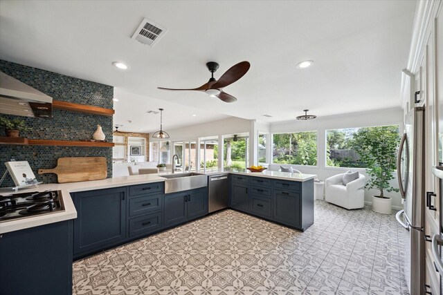 1415 Lehman St, Houston, TX 77018 - kitchen with a sink, stainless steel appliances, open floor plan, healthy amount of natural light, and recessed lighting