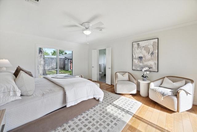 1415 Lehman St, Houston, TX 77018 - bedroom featuring ornamental molding, wood finished floors, ceiling fan, ensuite bath, and baseboards