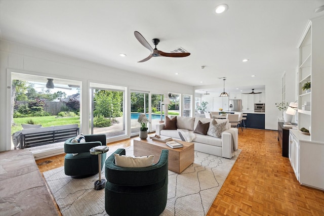 1415 Lehman St, Houston, TX 77018 - living room featuring a ceiling fan and recessed lighting