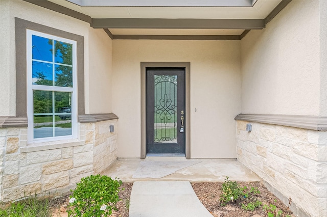 12106 Lantern Ln, Pinehurst, TX 77362 - property entrance featuring stucco siding and stone siding