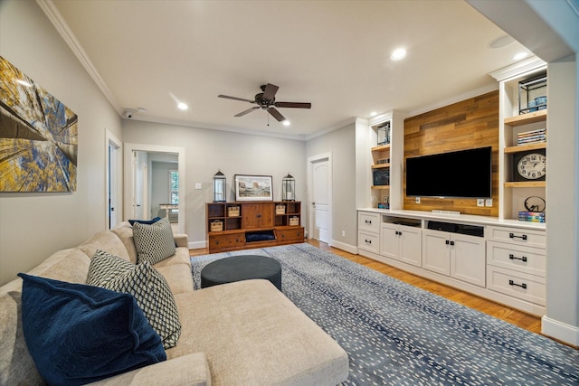 4504 Birch St, Bellaire, TX 77401 - living room with crown molding, ceiling fan, light wood-style floors, baseboards, and recessed lighting