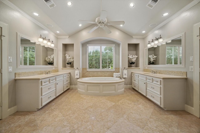4504 Birch St, Bellaire, TX 77401 - bathroom featuring crown molding, ceiling fan, two vanities, lofted ceiling, and a garden tub