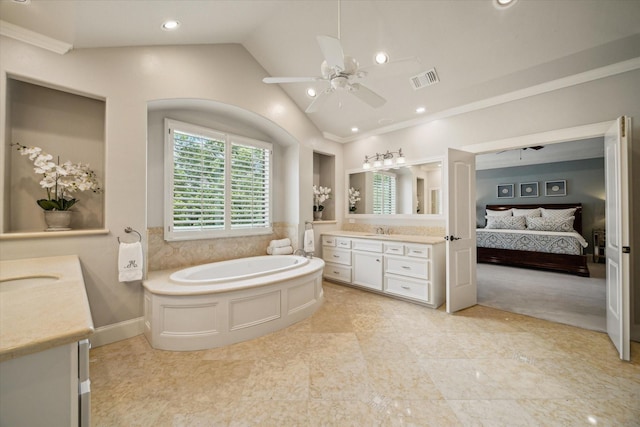 4504 Birch St, Bellaire, TX 77401 - ensuite bathroom with ceiling fan, two vanities, vaulted ceiling, a bath, and recessed lighting