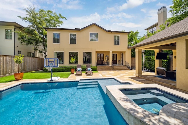 4504 Birch St, Bellaire, TX 77401 - view of swimming pool with an in-ground hot tub, a patio area, and fence