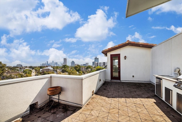 5211 Calle Cordoba Pl, Houston, TX 77007 - view of patio featuring a skyline view and area for grilling