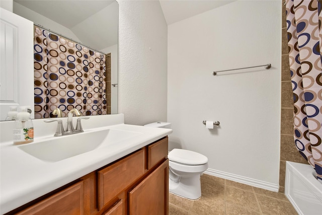 full bathroom featuring vaulted ceiling, toilet, vanity, and baseboards