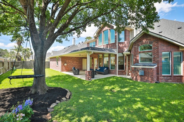 13911 Falcon Heights Dr, Cypress, TX 77429 - back of property with brick siding, a patio area, an outdoor living space, and a shingled roof