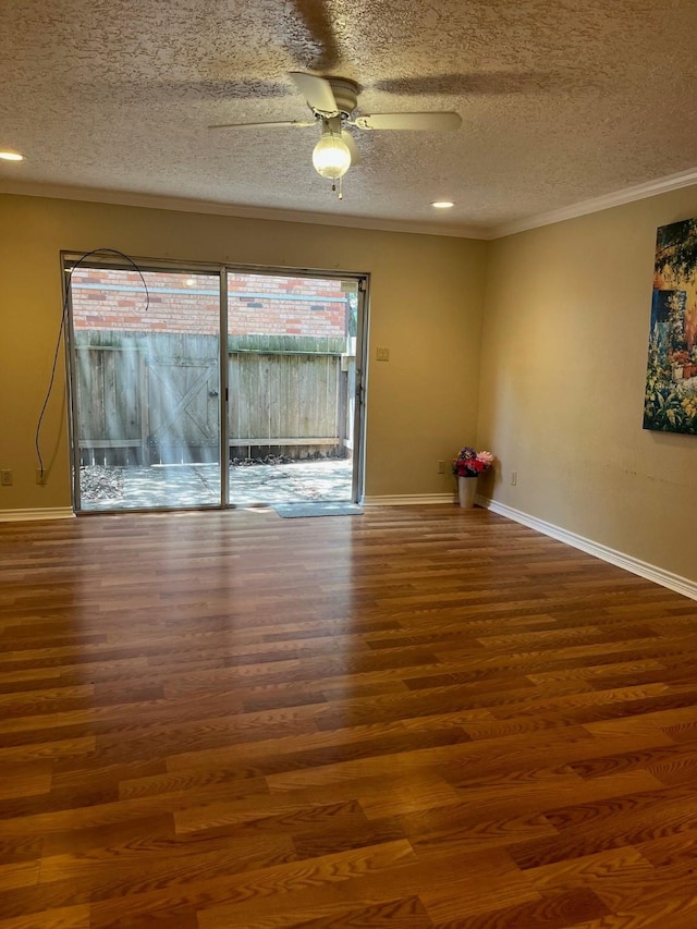 5207 Arboles Dr Unit 3, Houston, TX 77035 - spare room featuring a textured ceiling, wood finished floors, a ceiling fan, crown molding, and baseboards