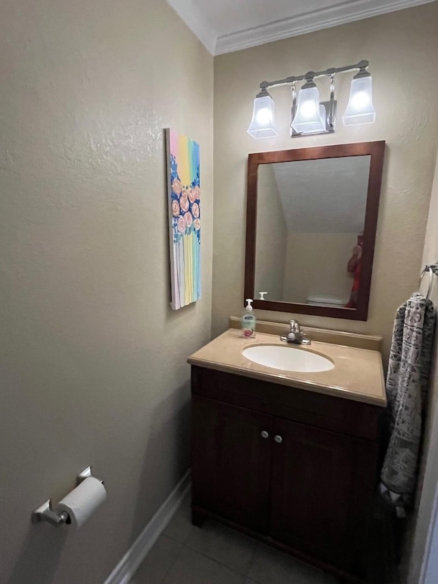 5207 Arboles Dr Unit 3, Houston, TX 77035 - bathroom with ornamental molding, tile patterned flooring, vanity, and baseboards