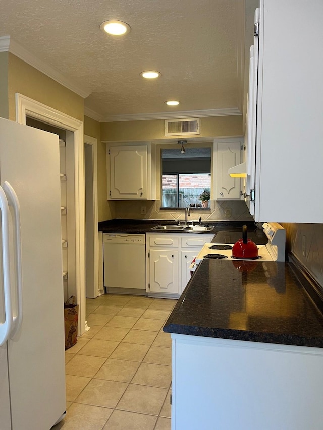 5207 Arboles Dr Unit 3, Houston, TX 77035 - kitchen featuring white appliances, a sink, crown molding, white cabinetry, and dark countertops