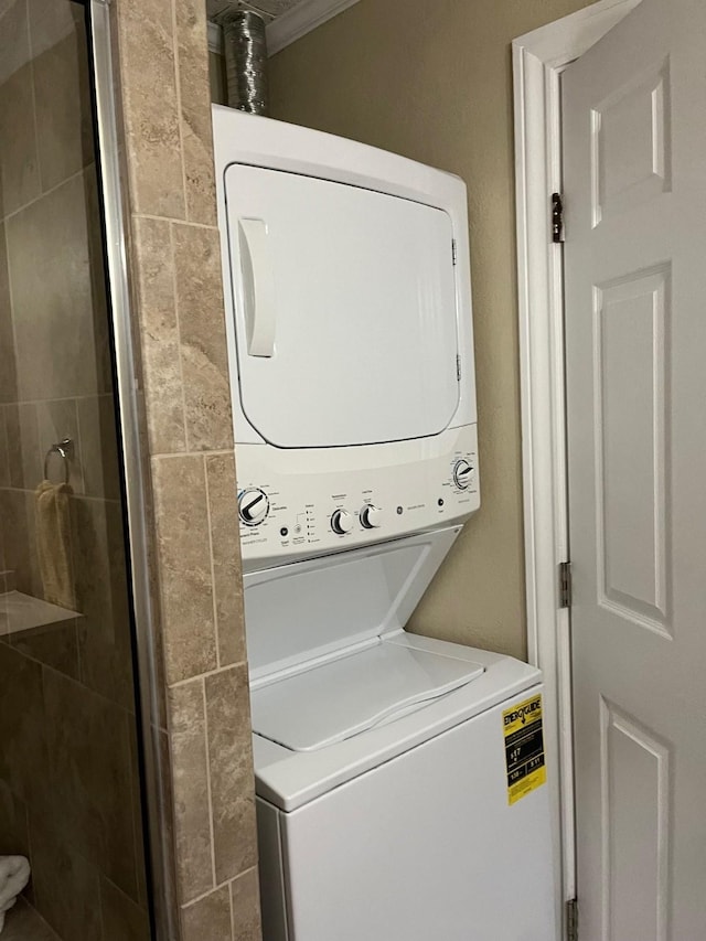 5207 Arboles Dr Unit 3, Houston, TX 77035 - washroom featuring stacked washer / dryer