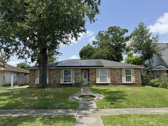 11111 Sagecrest Ln, Houston, TX 77089 - single story home with a front yard and roof mounted solar panels