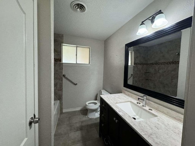 11111 Sagecrest Ln, Houston, TX 77089 - bathroom with vanity, a textured ceiling, toilet, baseboards, and tub / shower combination