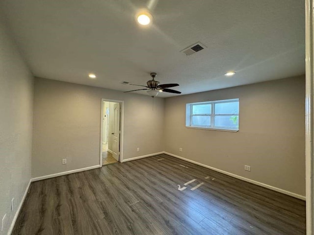 11111 Sagecrest Ln, Houston, TX 77089 - spare room featuring baseboards, dark wood finished floors, ceiling fan, and recessed lighting