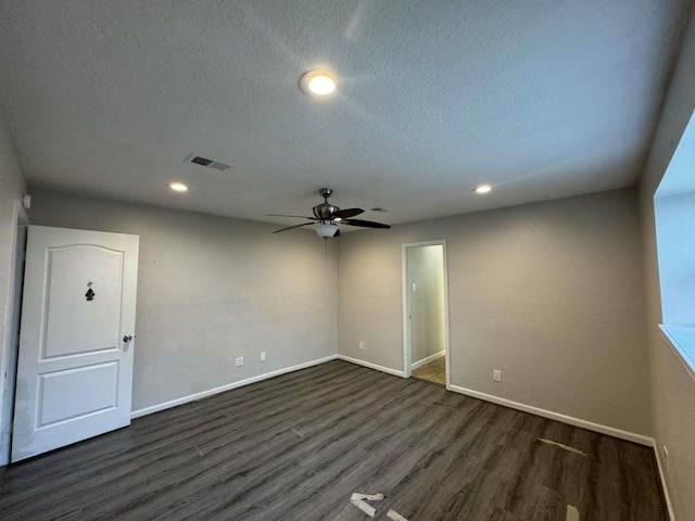 11111 Sagecrest Ln, Houston, TX 77089 - unfurnished room with a ceiling fan, dark wood-type flooring, baseboards, a textured ceiling, and recessed lighting