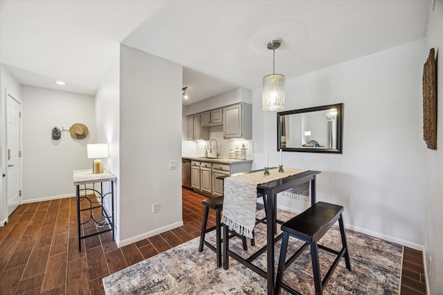 1860 White Oak Dr Unit 246, Houston, TX 77009 - dining area with baseboards, dark wood finished floors, and recessed lighting