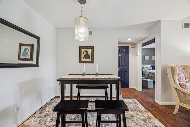 1860 White Oak Dr Unit 246, Houston, TX 77009 - dining area with dark wood finished floors and baseboards