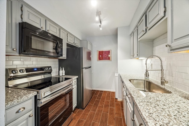 1860 White Oak Dr Unit 246, Houston, TX 77009 - kitchen featuring stainless steel electric range, black microwave, a sink, and tasteful backsplash