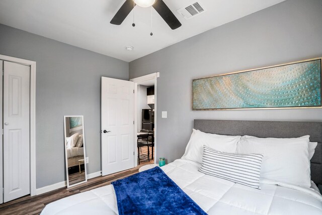 3409 Providence St, Houston, TX 77020 - bedroom with wood finished floors, ceiling fan, and baseboards