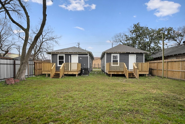 3409 Providence St, Houston, TX 77020 - rear view of property featuring a wooden deck and a shingled roof
