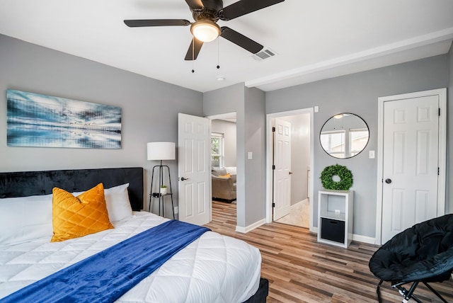 3409 Providence St, Houston, TX 77020 - bedroom with wood finished floors, baseboards, and ceiling fan