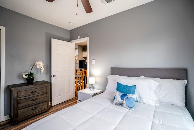 3409 Providence St, Houston, TX 77020 - bedroom featuring wood finished floors and a ceiling fan