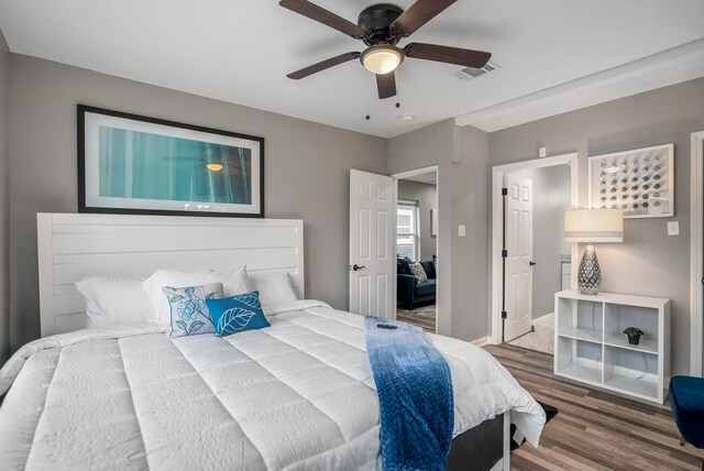 3409 Providence St, Houston, TX 77020 - bedroom with wood finished floors, baseboards, and ceiling fan