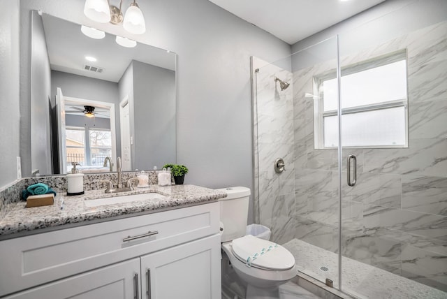 3409 Providence St, Houston, TX 77020 - full bathroom featuring a marble finish shower, toilet, ceiling fan, and vanity