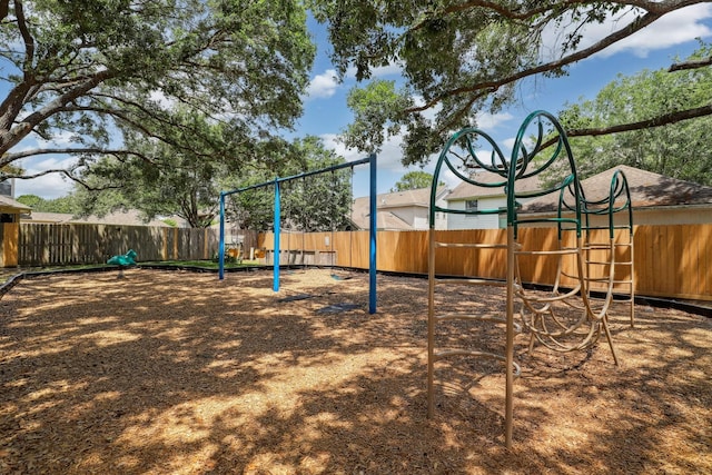 2203 Centerbrook Ln, Katy, TX 77450 - view of playground featuring fence