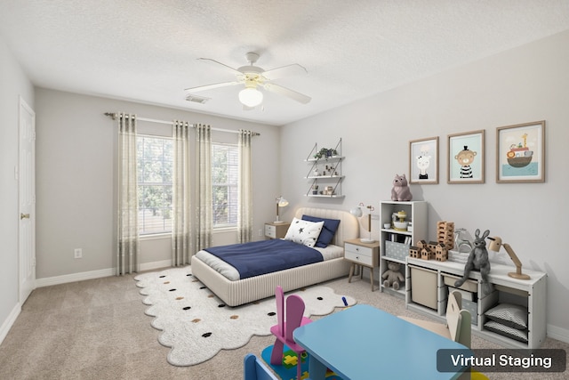 2203 Centerbrook Ln, Katy, TX 77450 - bedroom with carpet, a textured ceiling, baseboards, and ceiling fan