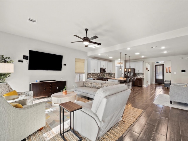 11715 Tranquility Summit Dr, Cypress, TX 77433 - living area featuring a ceiling fan, dark wood finished floors, recessed lighting, baseboards, and plenty of natural light