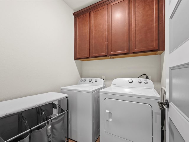 11715 Tranquility Summit Dr, Cypress, TX 77433 - laundry area featuring washer and clothes dryer and cabinet space