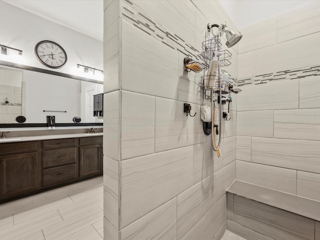 11715 Tranquility Summit Dr, Cypress, TX 77433 - full bathroom with a tile shower and double vanity