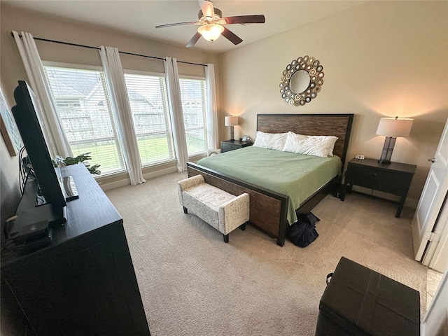 14008 N Frost Creek Dr, Pearland, TX 77584 - bedroom featuring light carpet and ceiling fan