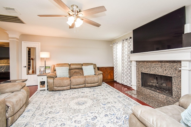 19711 Arbor Creek Dr, Katy, TX 77449 - living room with ceiling fan, wood finished floors, and a premium fireplace