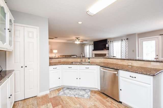 19711 Arbor Creek Dr, Katy, TX 77449 - kitchen featuring dishwasher, a sink, plenty of natural light, a ceiling fan, and recessed lighting