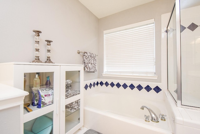 19711 Arbor Creek Dr, Katy, TX 77449 - bathroom featuring a garden tub