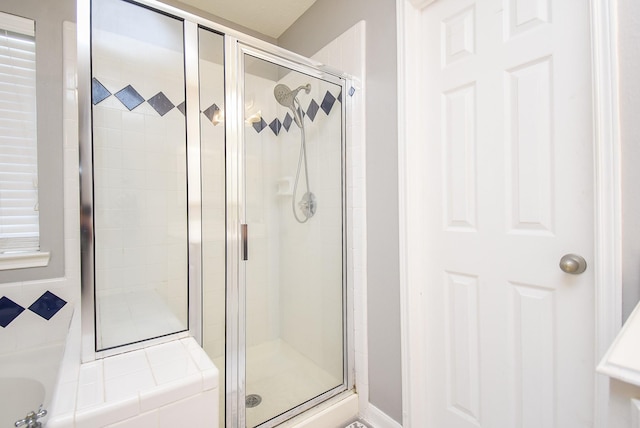 19711 Arbor Creek Dr, Katy, TX 77449 - full bathroom featuring a shower stall and a garden tub