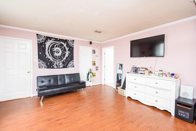 19711 Arbor Creek Dr, Katy, TX 77449 - living area with wood finished floors and ornamental molding