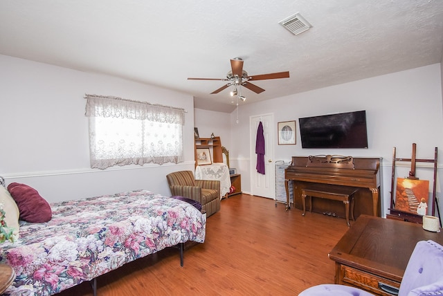 19711 Arbor Creek Dr, Katy, TX 77449 - bedroom with wood finished floors and ceiling fan