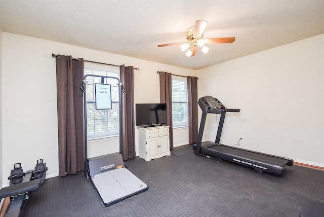 19711 Arbor Creek Dr, Katy, TX 77449 - workout area featuring baseboards, a ceiling fan, and plenty of natural light