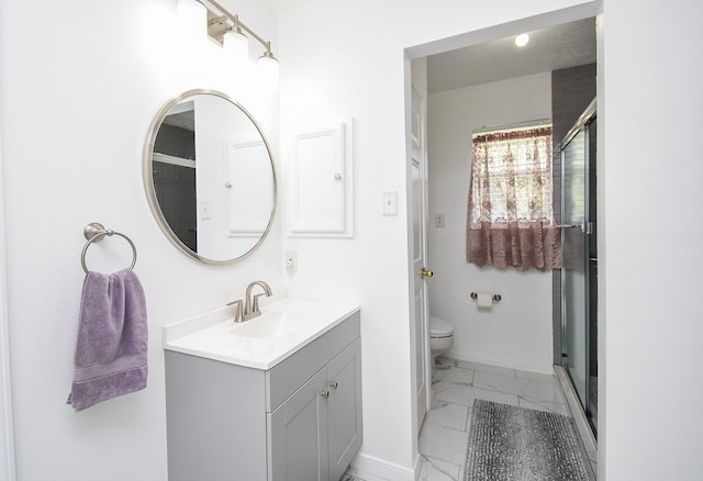 19711 Arbor Creek Dr, Katy, TX 77449 - bathroom with marble finish floors, vanity, toilet, and a shower stall