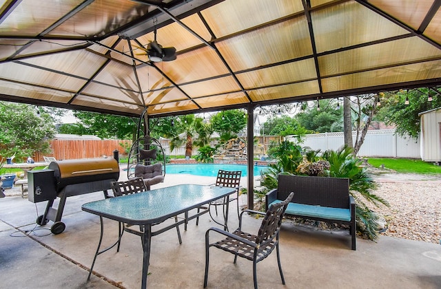 19711 Arbor Creek Dr, Katy, TX 77449 - view of patio / terrace with a gazebo, a fenced backyard, and an outdoor hangout area