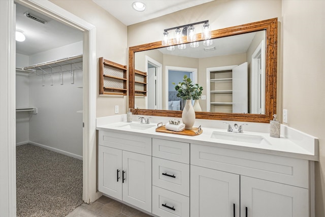 1244 W 18th St, Houston, TX 77008 - full bath with double vanity, a spacious closet, and baseboards